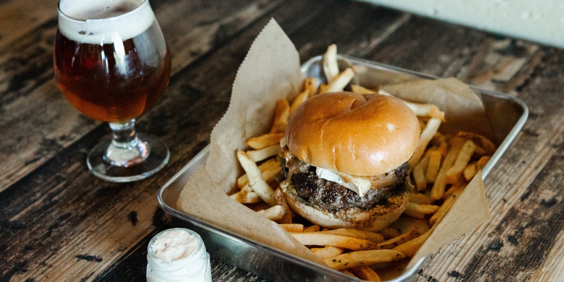 A burger and frites with a craft beer at Hopfields