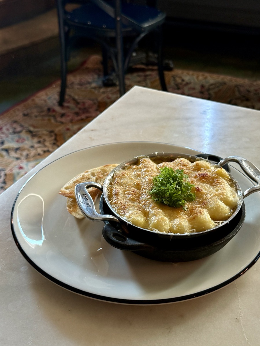 Hachis Parmentier at Hopfields: ground beef under pommes purée and gruyère, in a cocotte with baguette